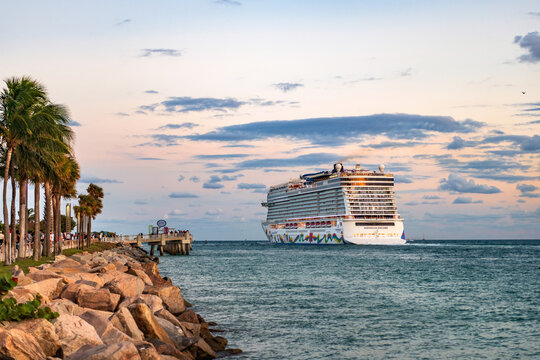 Miami, Florida, USA - December 23, 2024: Norwegian Encore cruise ship voyage. Cruise in summer vacation. Norwegian cruise line. Cruise ship tour and travel at sea. Ship leaving Miami port