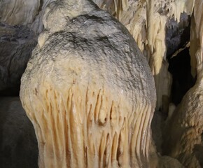 huge stalagmite in a cave