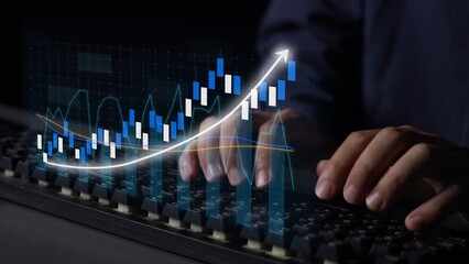 Close-up of hands typing on a keyboard with a vibrant financial graph in the background, representing data analysis, growth, and technology in finance. Copula