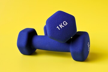 blue barbell on yellow background