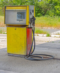 Padlock at Yellow Fuel Pump at Old Petrol Station