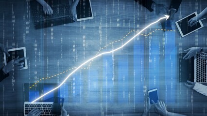 A dynamic business environment showcases a team using various digital devices to analyze financial trends, fostering collaboration and innovation for growth and success. Copula