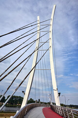 Fototapeta premium Cable-stayed pedestrian bridge structure over Lake Malta in Poznan