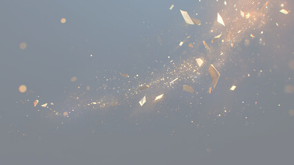 Golden confetti or fragments flying on dark blue background