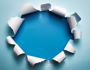 torn white paper revealing bright blue background symbolizing discovery transition and creative breakthrough for editorial and conceptual use