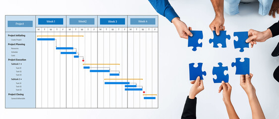 This image showcases a team engaged in project management with a Gantt chart, highlighting collaboration in planning, execution, and effective task management. Amity