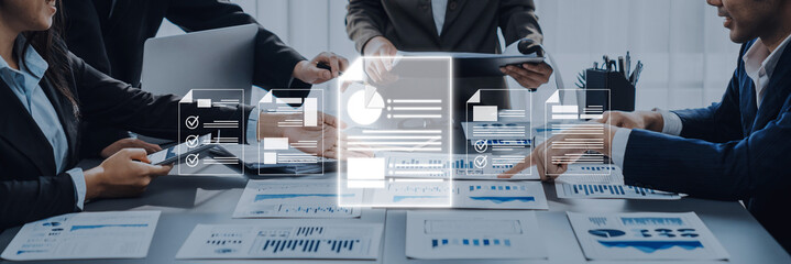 Professionals engage in a collaborative business meeting, analyzing digital data visualizations and reports, enhancing strategic planning and decision-making processes. Trope