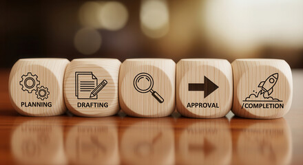 Wooden cubes showing workflow segmentation icons aligned using crisp macro detail and softly glowing background blur