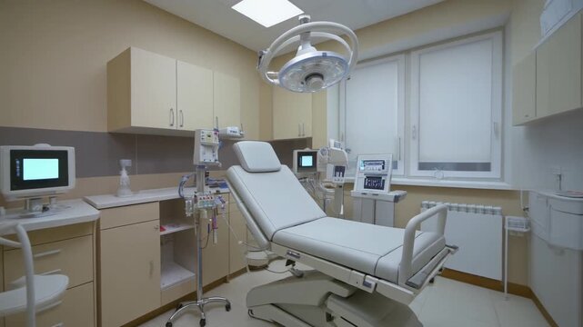 Modern medical examination room with professional equipment and natural light