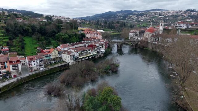 Amarante city on Tamega river, Igreja de Sao Goncalo catholic church in the evening, Drone shot, Panorama