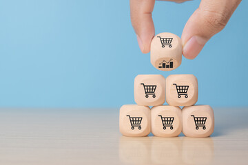 pyramid of wooden cubes with sales icons. Sale volume increase make business grow, cube with icon...