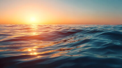 Obraz premium Golden Sunset Over Calm Ocean Waves Reflecting Sunlight.