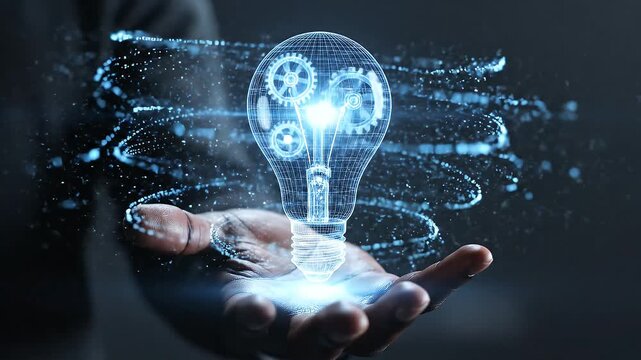 Innovative business concept with glowing lightbulb and gears in hand