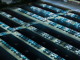 Night View of Solar Canopy Parking Lot with Illuminated Panels