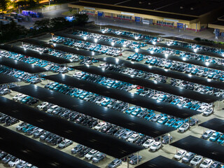 Night View of Solar Canopy Parking Lot with Illuminated Panels