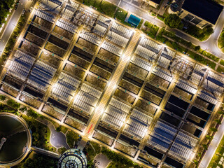 Aerial Night View of Illuminated Wastewater Treatment Plant