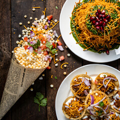 Top View of Assorted Indian Street Food Chaat Including Bhel Puri Sev Puri and Snacks
