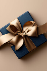 Elegant blue gift box with a luxurious golden ribbon, perfect for any special occasion or celebration.