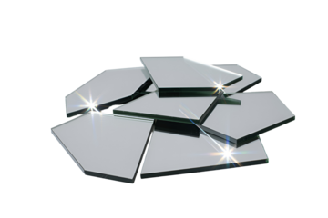 Pile of small irregular mirror shards isolated on transparent background