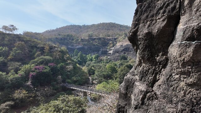 Ajanta Caves are a UNESCO World Heritage site renowned for their ancient Indian rock-cut Buddhist cave monuments, including exquisite paintings and sculptures.