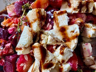 Beetroot salad with pumpkin, feta cheese, assorted seeds and herbs