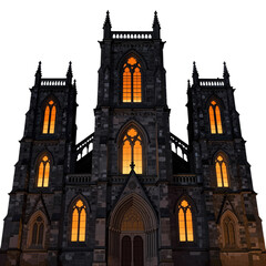 Fototapeta premium Gothic cathedral facade with illuminated stained glass windows