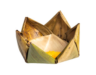 Handmade Thai banana leaf lotus shaped container or krathong with yellow flower petals for traditional festival eco packaging on isolated background