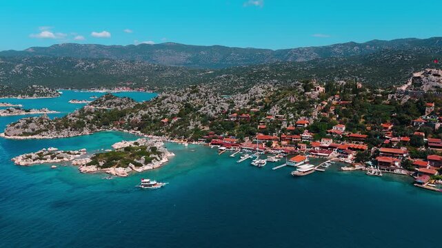 Aerial view of Kalek&ouml;y (Simena), a historic coastal village with its ancient Simena Castle overlooking the bay in Antalya, Turkey.