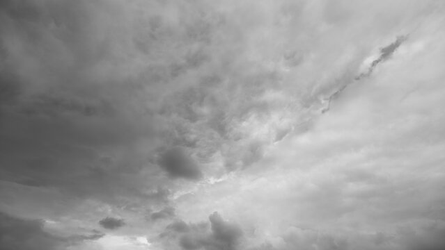 Foreboding sky filled with swirling storm clouds creates dramatic tension, Intense weather depiction showcasing heavy cloud formations for cinematic and suspenseful storytelling