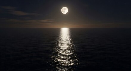 Full moon over ocean at night with moonlit water reflection