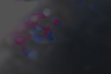 dark abstract light reflections with lens flares blurry red, blue, and white shades
