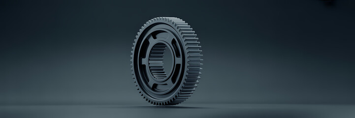 A hyper realistic 3d render of a single dark metallic gear with internal teeth and a central hole against a dark gradient background