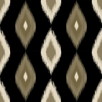 Black ikat diamond seamless pattern with textured tribal look, ideal for fashion fabric, boho wallpaper, modern ethnic backgrounds, and home decor.