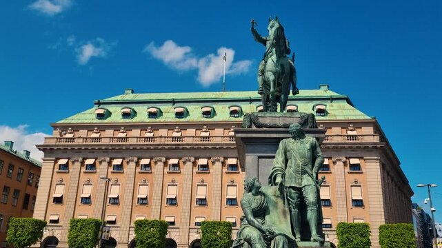 Statue of King Gustav II Adolf at Gustav Adolfs torg in Stockholm, Sweden, a historically and politically significant square under a bright blue sky