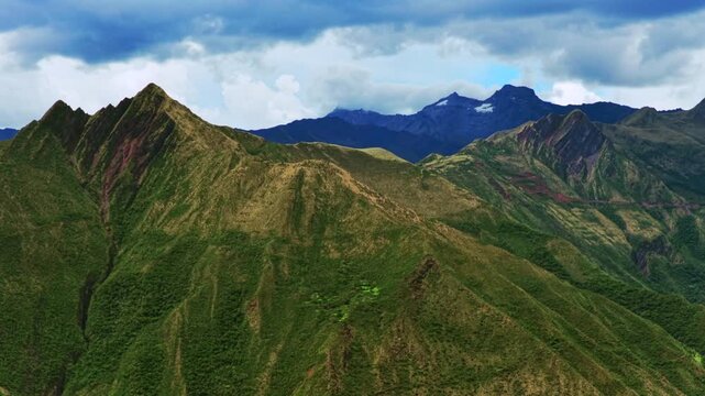 Peruvian Andes mountain range Limatambo Heertahuayco mount Humantay Salkantay Peru aerial drone highlands avocado farm crops Cusco region warm climate Soray rainy season clouds parallax circle left