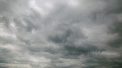 Fototapeta premium Dramatically Overcast and Dark Clouds are Covering the Beautiful Sky Above Us Completely