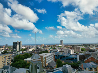 High Angle Drone Camera Footage of Swansea City Centre Near Coastal Beach During Sunny Day of July 14th, 2025. Swansea is Most Beautiful, Modern City and county on the south coast of Wales, UK