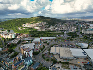 High Angle Drone Camera Footage of Swansea City Centre Near Coastal Beach During Sunny Day of July 14th, 2025. Swansea is Most Beautiful, Modern City and county on the south coast of Wales, UK