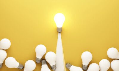 Leadership and innovation concept with one bright light bulb rising above many unlit bulbs on yellow background symbolizing unique idea success and creativity 3d rendering