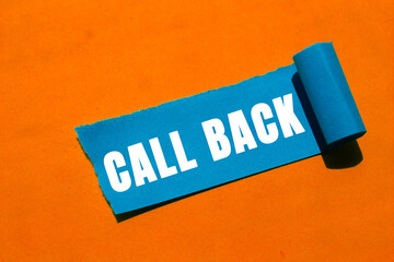 Call Back message written on ripped torn paper background. Conceptual Call Back symbol. Copy space.