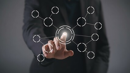 Touch-activated network diagram with central hub and branching circular nodes in a dark tech scene