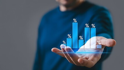 Hand-held blue bar chart with percent icons – data visualization concept