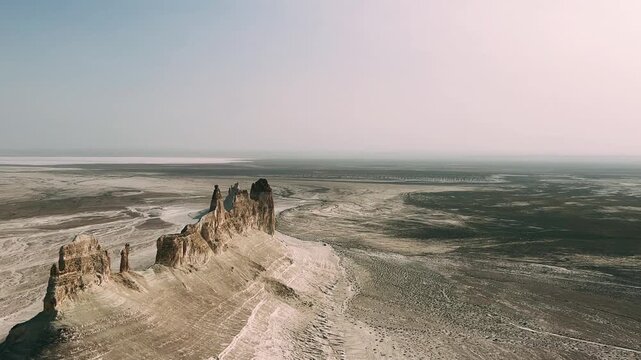 Mount Bozzhira, Mangystau. View of the cliffs of the Ustyurt plateau in Western Kazakhstan. Beautiful white rocks in the endless white valley of Mangystau region.Rock formations of the Bozzhyr valley.