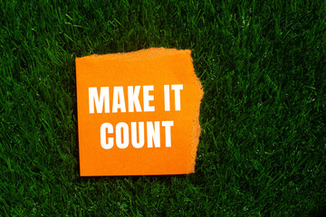 Make it count message written on ripped torn paper background. Conceptual Make it count symbol....