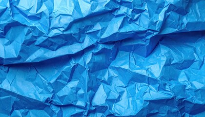 Obraz premium Intense close-up of deeply creased, vibrant blue paper