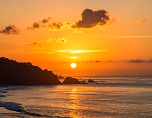 A vibrant sunset casts a golden glow over a calm ocean, silhouetting a coastline with rocky formations. Fluffy clouds dot the orange sky