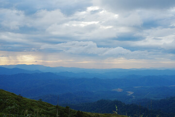 Kanchanaburi, Thailand,  December 5, 2025 :
Mountain ridge with beautiful blue sky of Nern
Chang Suek Viewpoint.