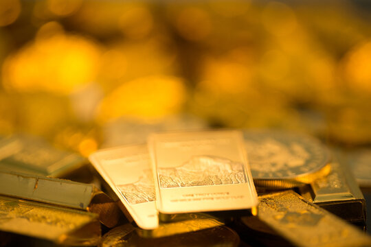 Gold Bars and Coins Collection - Wealth Investment Closeup