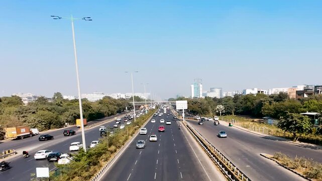 view of Gurugram city highway, view of traffic in India, timelapse traffic in Indian city, Haryana, India