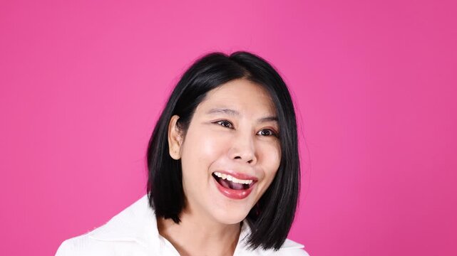 Woman Expressing Sadness and Frustration Against Pink Background